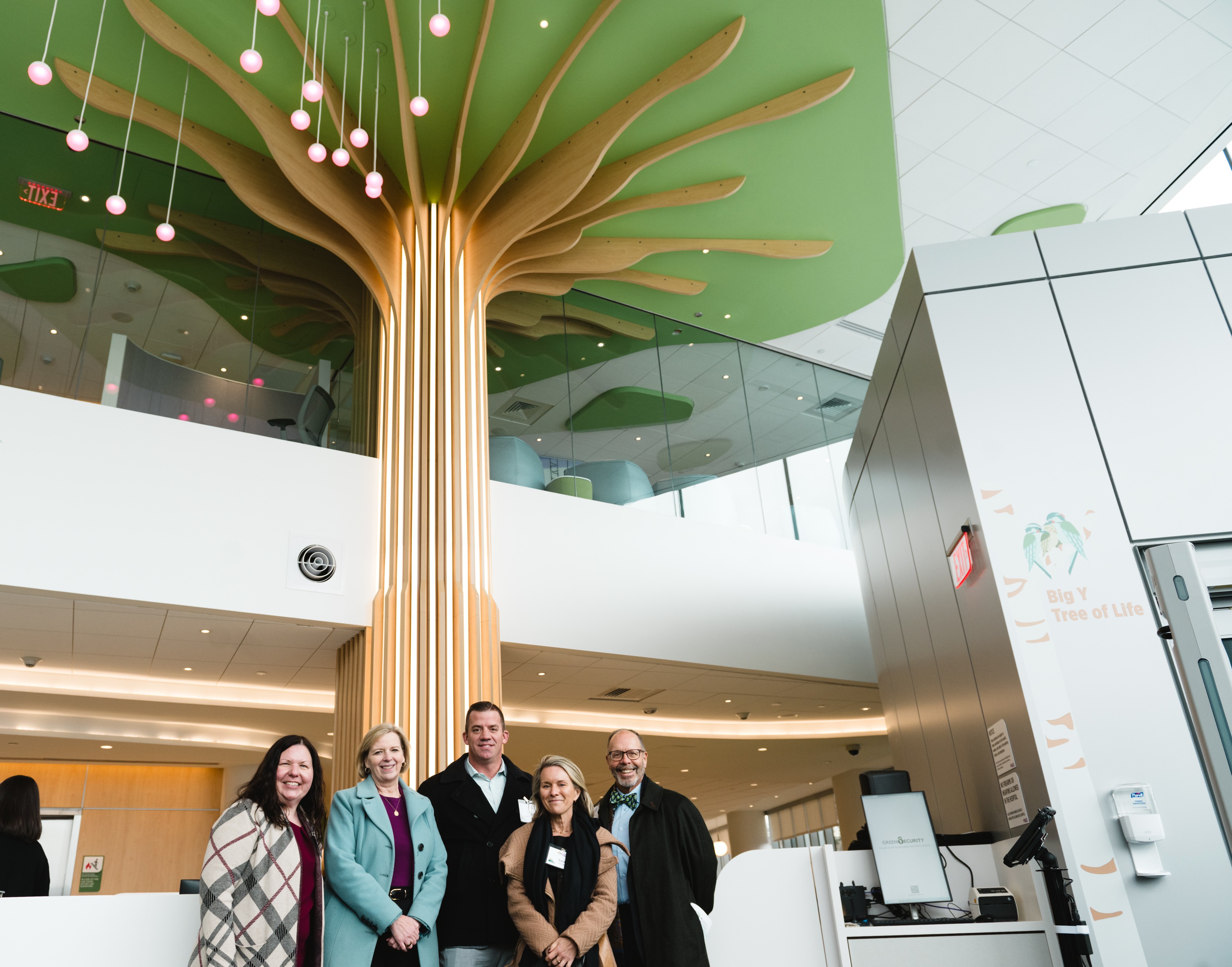 Big Y Philanthropy Committee in Connecticut Children's Lobby, in front of Tree of Life