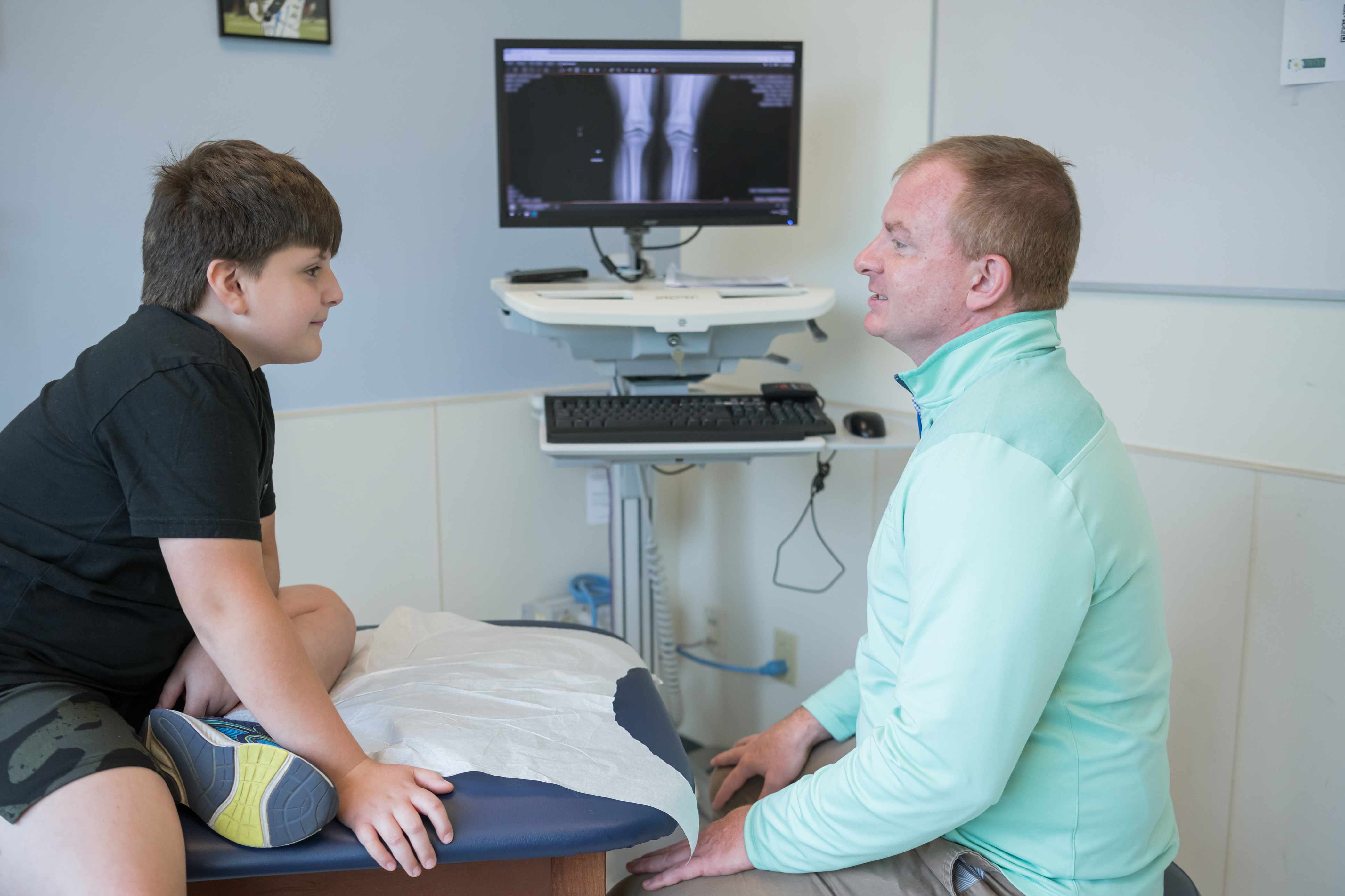Provider treating Patient in Sports Medicine Department Provider treating Patient in Sports Medicine Department