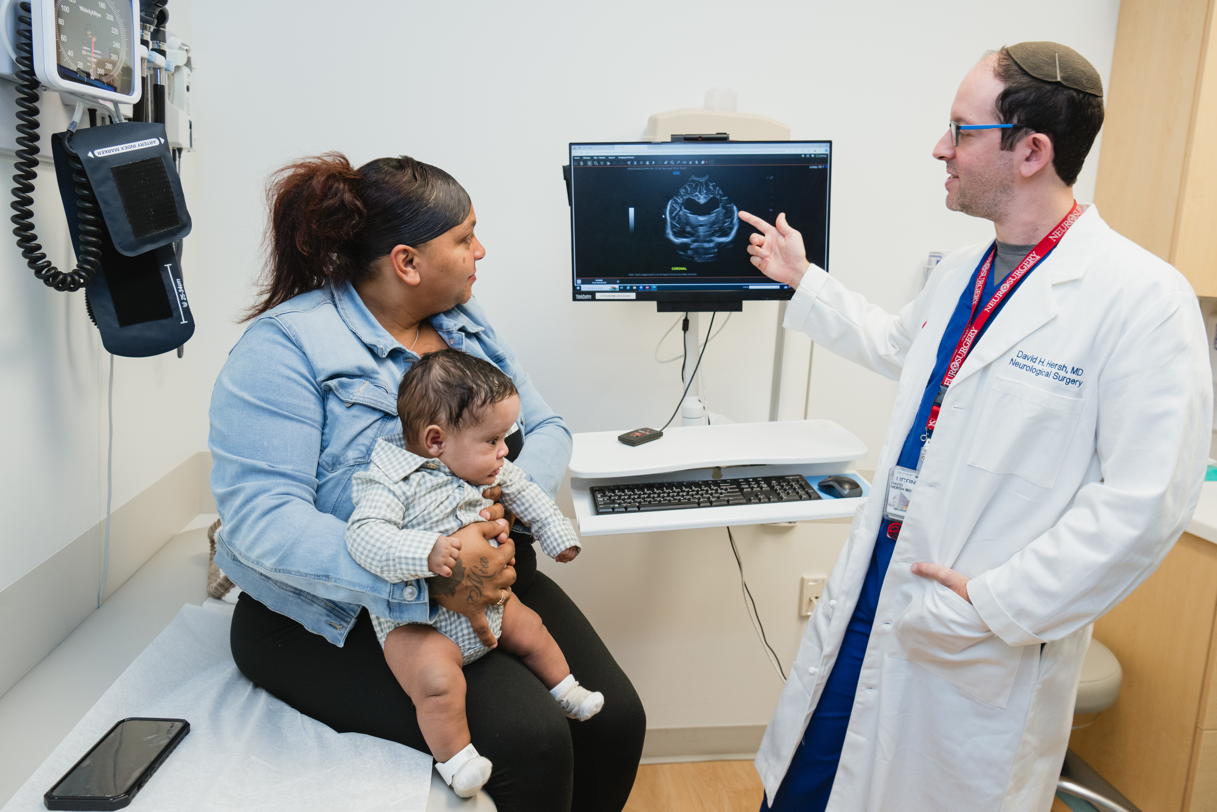 Patient and mom with David Hersh, MD, pediatric neurosurgeon
