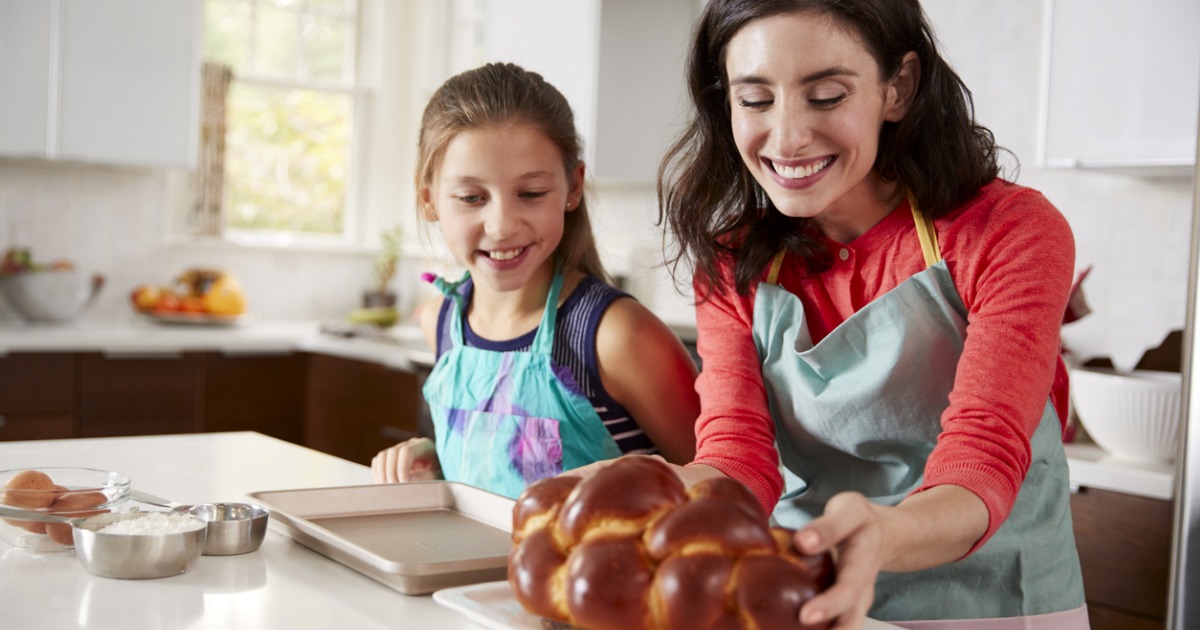 A mother and daughter bake Challah