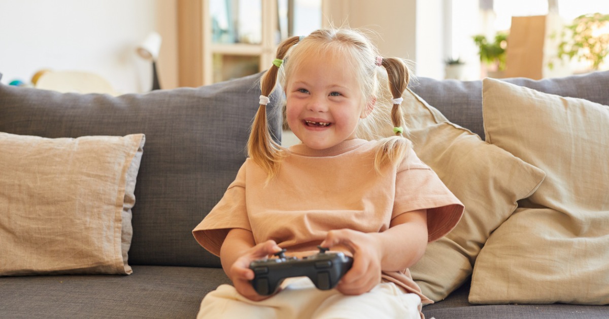 A young girl playing video games