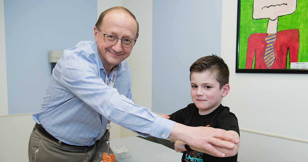 Jacob with Connecticut Children’s Dr. Acsadi