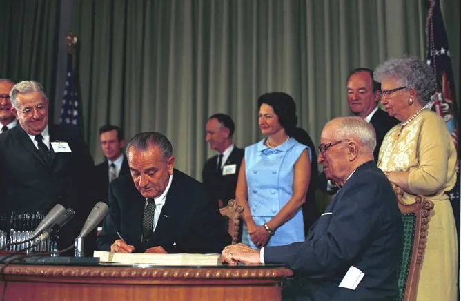 President Johnson signing the Medicaid bill