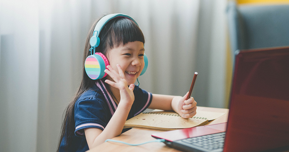 Young girl during remote learning