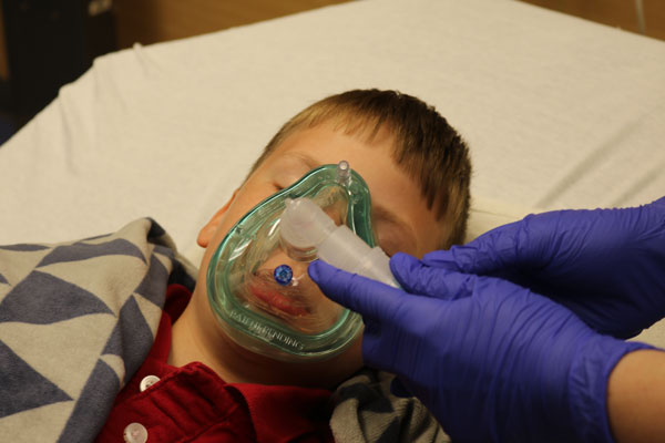 child being sedated