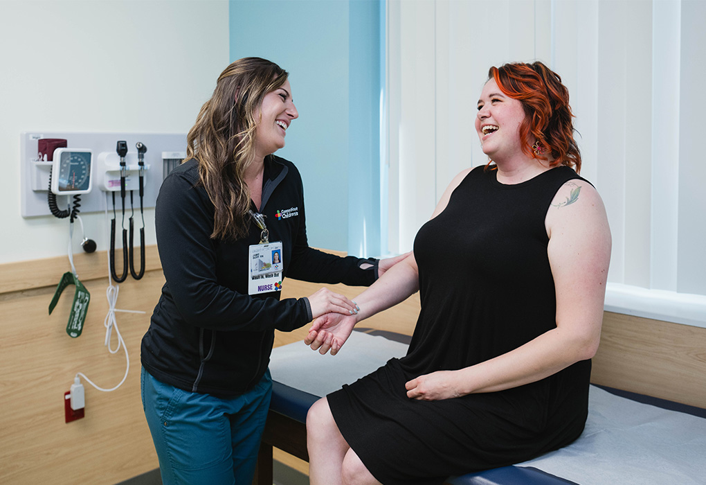 Adult congenital heart disease patient speaks with a team member