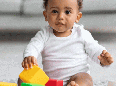 Baby playing with blocks