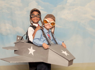 2 boys dressed as pilots in a play