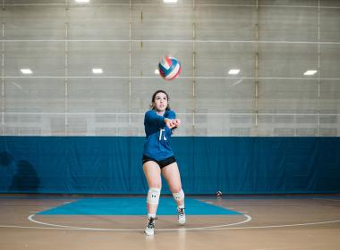 Melina playing volleyball