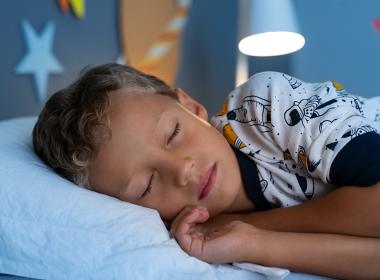 A young boy sleeping