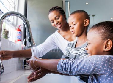 children washing their hands