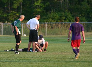 Soccer player down on field with injury