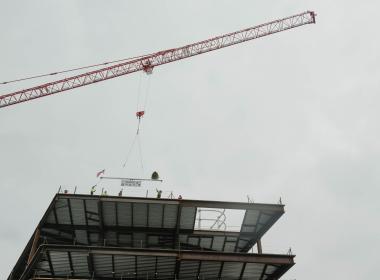 Crane placing steel on top of Connecticut Children's Medical Center