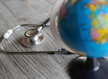 A globe and a stethoscope 