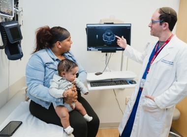 Patient and mom with David Hersh, MD, pediatric neurosurgeon