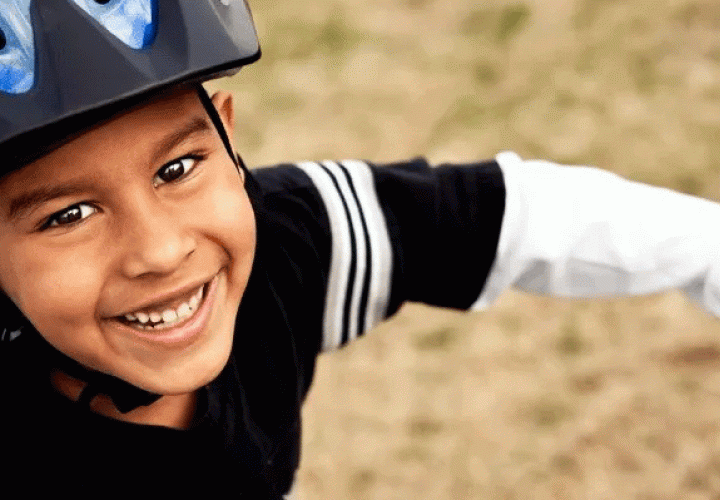 Boy wearing a bike helmet