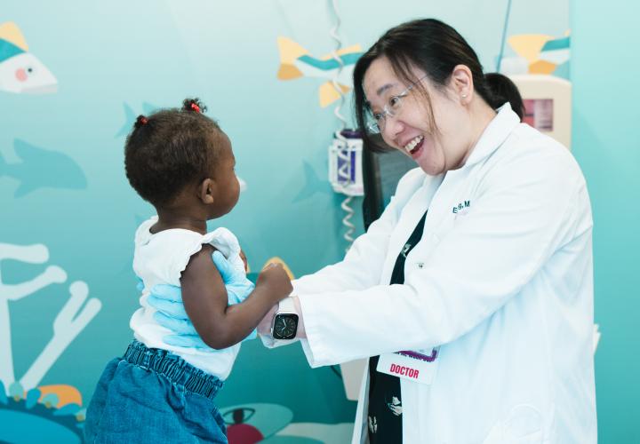Dr. Ng, neurologist, examines a patient in the Westport Specialty Care Center neurology clinic.