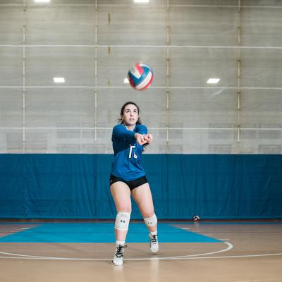 Melina playing volleyball