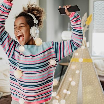 Girl dancing alone in her room