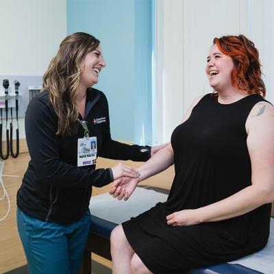 Adult congenital heart disease patient speaks with a team member